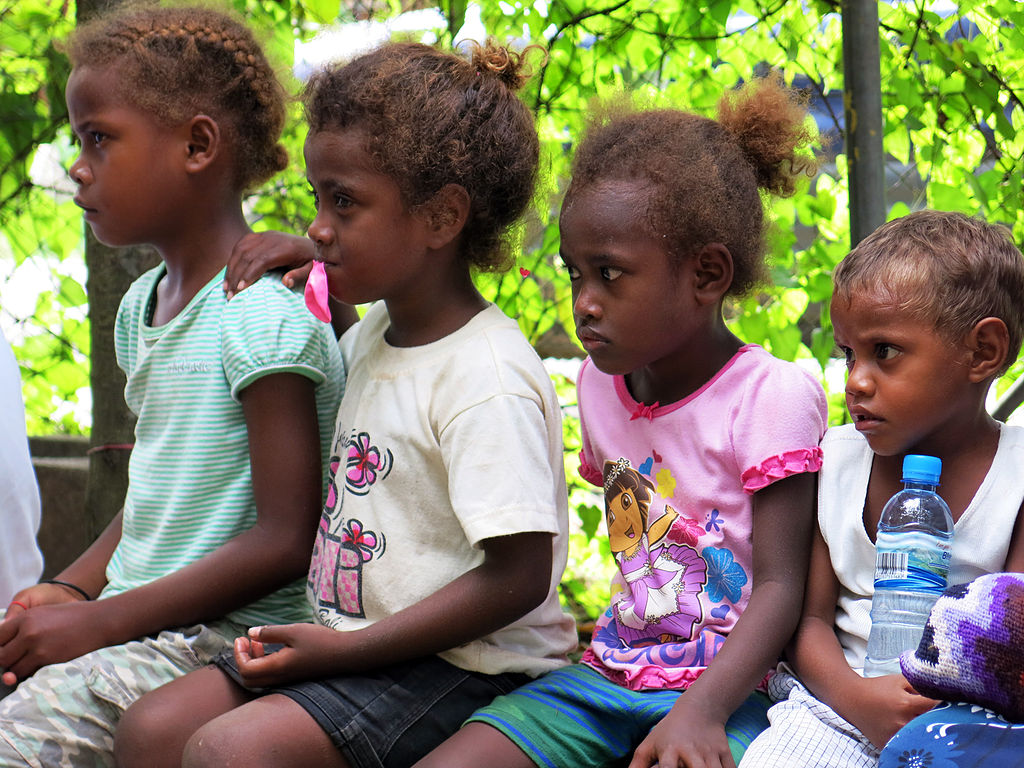 Young kids watch a play about gender based violence at the Young Women’s Christian Association. 