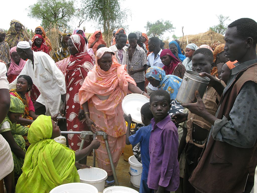 Refugees queue for water in the Jamam camp, South Sudan
